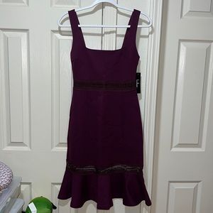 Bodycon dress with lace and flare details